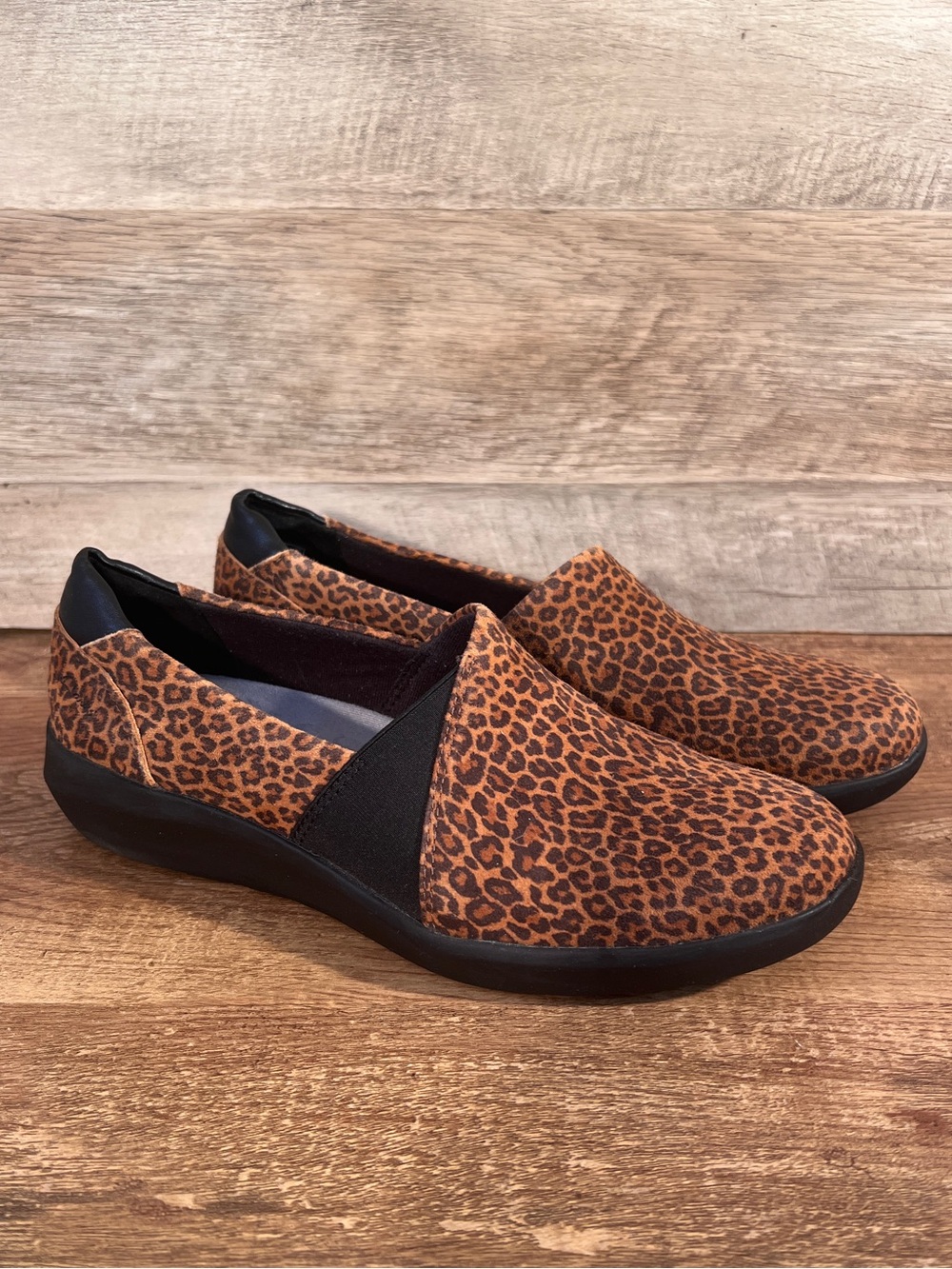 Clarks Cheetah Print Slip-On Flats in Brown and Black Kayleigh Step Loafers‎